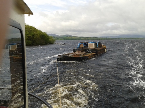 77.M under tow coming through the Hare Island, Lough Derg,.